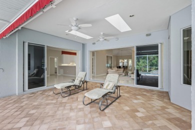 THIS LOVELY LAKEFRONT HOME IS SITUATED IN EATON PLACE, WHICH IS on University Park Country Club in Florida - for sale on GolfHomes.com, golf home, golf lot