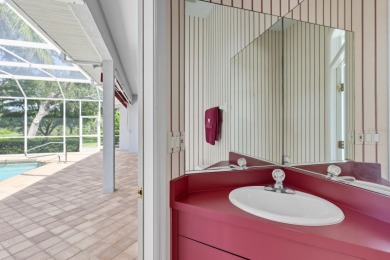 THIS LOVELY LAKEFRONT HOME IS SITUATED IN EATON PLACE, WHICH IS on University Park Country Club in Florida - for sale on GolfHomes.com, golf home, golf lot