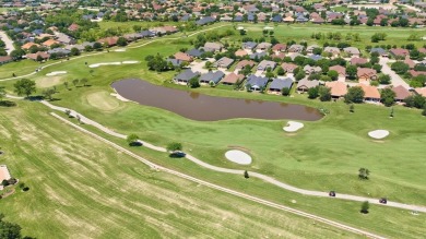 This beautifully maintained corner lot half duplex home is on Wildhorse Golf Club of Robson Ranch in Texas - for sale on GolfHomes.com, golf home, golf lot
