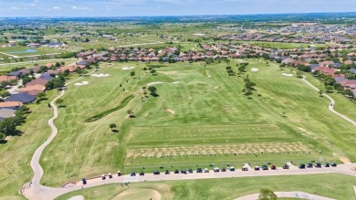 This beautifully maintained corner lot half duplex home is on Wildhorse Golf Club of Robson Ranch in Texas - for sale on GolfHomes.com, golf home, golf lot