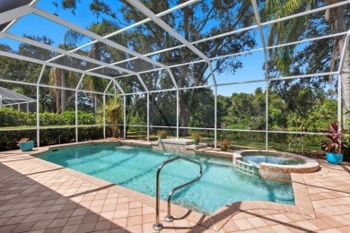 THIS LOVELY LAKEFRONT HOME IS SITUATED IN EATON PLACE, WHICH IS on University Park Country Club in Florida - for sale on GolfHomes.com, golf home, golf lot