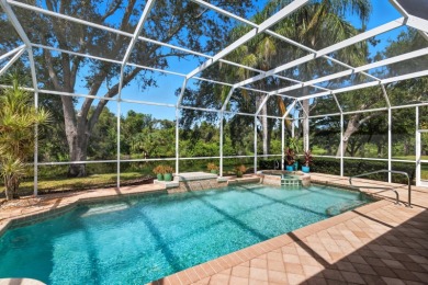 THIS LOVELY LAKEFRONT HOME IS SITUATED IN EATON PLACE, WHICH IS on University Park Country Club in Florida - for sale on GolfHomes.com, golf home, golf lot