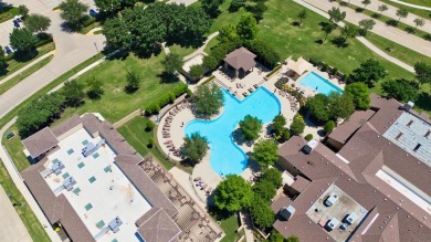 This beautifully maintained corner lot half duplex home is on Wildhorse Golf Club of Robson Ranch in Texas - for sale on GolfHomes.com, golf home, golf lot