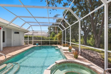 THIS LOVELY LAKEFRONT HOME IS SITUATED IN EATON PLACE, WHICH IS on University Park Country Club in Florida - for sale on GolfHomes.com, golf home, golf lot