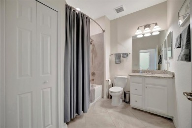 This stunning three-bedroom, two-bath second floor coach home on Lakewood National Golf Club in Florida - for sale on GolfHomes.com, golf home, golf lot