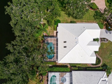THIS LOVELY LAKEFRONT HOME IS SITUATED IN EATON PLACE, WHICH IS on University Park Country Club in Florida - for sale on GolfHomes.com, golf home, golf lot
