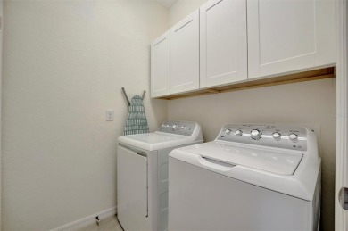 This stunning three-bedroom, two-bath second floor coach home on Lakewood National Golf Club in Florida - for sale on GolfHomes.com, golf home, golf lot