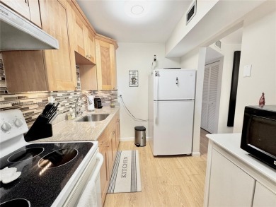 Clean and Bright! Updated One bedroom has enclosed balcony with on Sunrise Lakes Phase III in Florida - for sale on GolfHomes.com, golf home, golf lot
