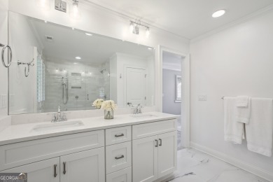 Lakefront living on Lake Peachtree! This stunning corner unit in on Canongate At Flat Creek Club in Georgia - for sale on GolfHomes.com, golf home, golf lot