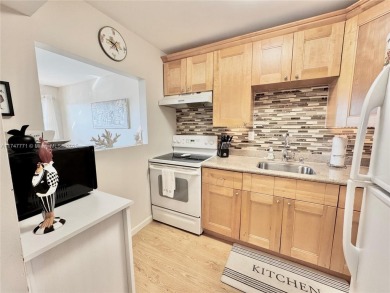 Clean and Bright! Updated One bedroom has enclosed balcony with on Sunrise Lakes Phase III in Florida - for sale on GolfHomes.com, golf home, golf lot