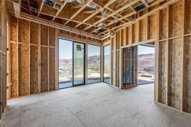 Available by winter 2025, this custom 2-story home is under on Dragon Ridge Country Club in Nevada - for sale on GolfHomes.com, golf home, golf lot