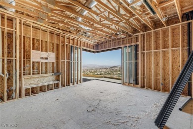 Available by winter 2025, this custom 2-story home is under on Dragon Ridge Country Club in Nevada - for sale on GolfHomes.com, golf home, golf lot