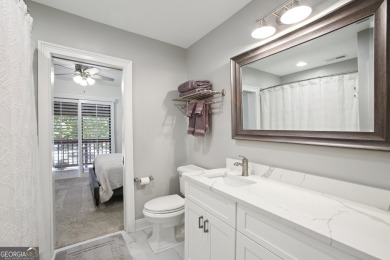 Lakefront living on Lake Peachtree! This stunning corner unit in on Canongate At Flat Creek Club in Georgia - for sale on GolfHomes.com, golf home, golf lot