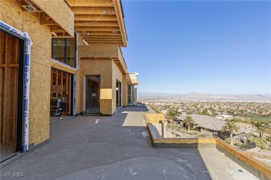 Available by winter 2025, this custom 2-story home is under on Dragon Ridge Country Club in Nevada - for sale on GolfHomes.com, golf home, golf lot