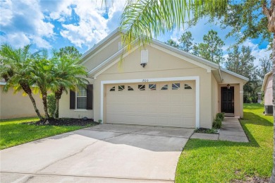 Welcome to this beautifully updated 3-bedroom, 2-bathroom home on Oaks National Golf Course in Florida - for sale on GolfHomes.com, golf home, golf lot