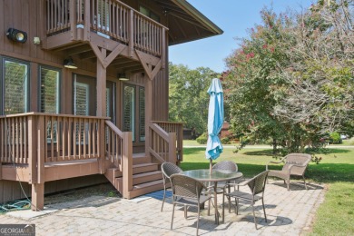 Lakefront living on Lake Peachtree! This stunning corner unit in on Canongate At Flat Creek Club in Georgia - for sale on GolfHomes.com, golf home, golf lot