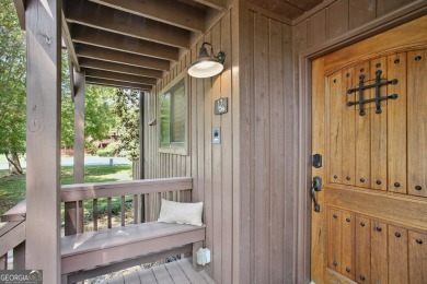 Lakefront living on Lake Peachtree! This stunning corner unit in on Canongate At Flat Creek Club in Georgia - for sale on GolfHomes.com, golf home, golf lot