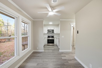 This charming, fully renovated 2-bed/1-bath townhome is ideal as on DeSoto Golf Course in Arkansas - for sale on GolfHomes.com, golf home, golf lot