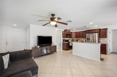 Welcome to this beautifully updated 3-bedroom, 2-bathroom home on Oaks National Golf Course in Florida - for sale on GolfHomes.com, golf home, golf lot