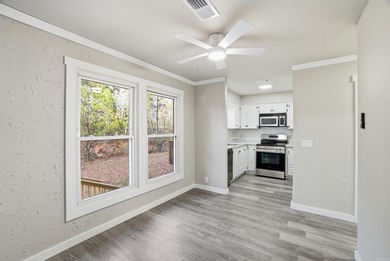 This charming, fully renovated 2-bed/1-bath townhome is ideal as on DeSoto Golf Course in Arkansas - for sale on GolfHomes.com, golf home, golf lot