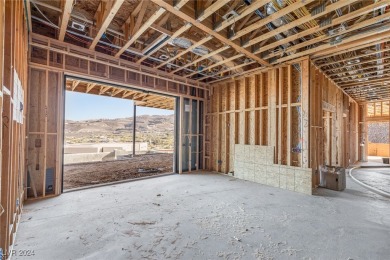 Available by winter 2025, this custom 2-story home is under on Dragon Ridge Country Club in Nevada - for sale on GolfHomes.com, golf home, golf lot