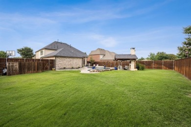 Nestled on a quiet cul-de-sac in the highly sought-after golf on Trophy Club of Dallas in Texas - for sale on GolfHomes.com, golf home, golf lot