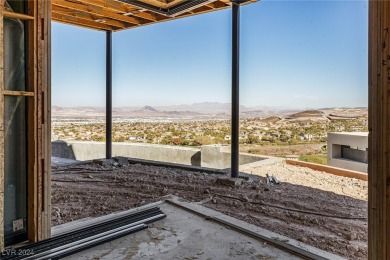 Available by winter 2025, this custom 2-story home is under on Dragon Ridge Country Club in Nevada - for sale on GolfHomes.com, golf home, golf lot