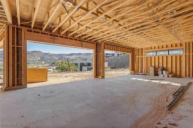 Available by winter 2025, this custom 2-story home is under on Dragon Ridge Country Club in Nevada - for sale on GolfHomes.com, golf home, golf lot