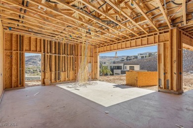 Available by winter 2025, this custom 2-story home is under on Dragon Ridge Country Club in Nevada - for sale on GolfHomes.com, golf home, golf lot