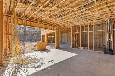 Available by winter 2025, this custom 2-story home is under on Dragon Ridge Country Club in Nevada - for sale on GolfHomes.com, golf home, golf lot