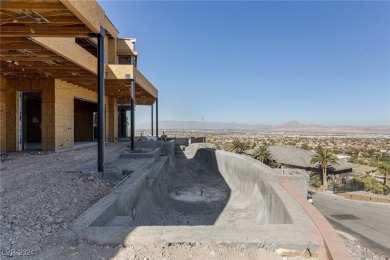 Available by winter 2025, this custom 2-story home is under on Dragon Ridge Country Club in Nevada - for sale on GolfHomes.com, golf home, golf lot