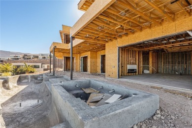 Available by winter 2025, this custom 2-story home is under on Dragon Ridge Country Club in Nevada - for sale on GolfHomes.com, golf home, golf lot