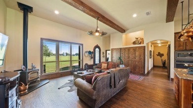 Only 50 miles from Dallas, this gorgeous stone brick home was on Indian Oaks Golf Club in Texas - for sale on GolfHomes.com, golf home, golf lot