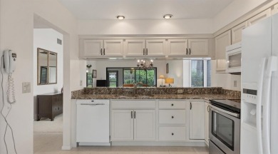 Beautiful end-unit with privacy and tranquil pond views in The on The Meadows Golf and Country Club in Florida - for sale on GolfHomes.com, golf home, golf lot