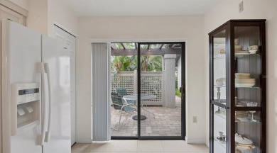 Beautiful end-unit with privacy and tranquil pond views in The on The Meadows Golf and Country Club in Florida - for sale on GolfHomes.com, golf home, golf lot
