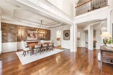 An exceptional entry point into The Manor Golf & Country Club on Manor Golf and Country Club in Georgia - for sale on GolfHomes.com, golf home, golf lot