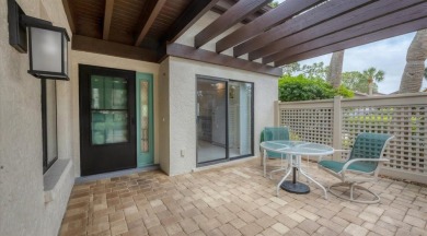 Beautiful end-unit with privacy and tranquil pond views in The on The Meadows Golf and Country Club in Florida - for sale on GolfHomes.com, golf home, golf lot