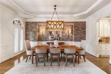 An exceptional entry point into The Manor Golf & Country Club on Manor Golf and Country Club in Georgia - for sale on GolfHomes.com, golf home, golf lot