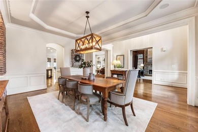 An exceptional entry point into The Manor Golf & Country Club on Manor Golf and Country Club in Georgia - for sale on GolfHomes.com, golf home, golf lot