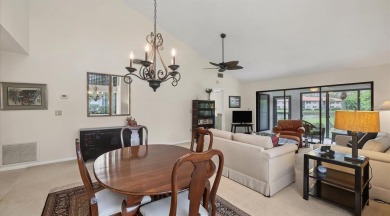 Beautiful end-unit with privacy and tranquil pond views in The on The Meadows Golf and Country Club in Florida - for sale on GolfHomes.com, golf home, golf lot