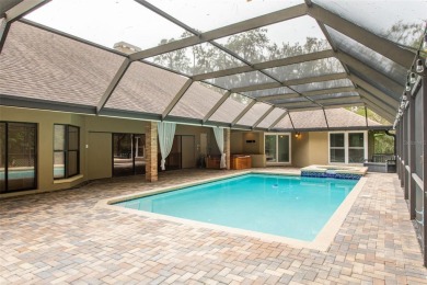 Luxury Pool Home with Modern Upgrades in Gated Deerpath on East Lake Woodlands Country Club in Florida - for sale on GolfHomes.com, golf home, golf lot