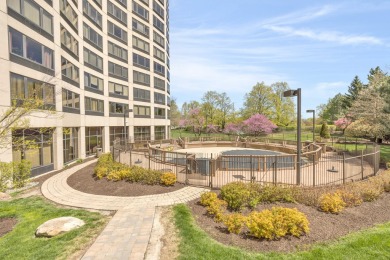 Stunning condo residing on the 13th floor, offering unparalleled on Evergreen Hills Golf Course in Michigan - for sale on GolfHomes.com, golf home, golf lot