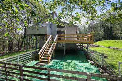This very well maintained home is ready to be loved by its new on Pocono Farms Country Club in Pennsylvania - for sale on GolfHomes.com, golf home, golf lot
