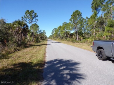 This lot is on a quiet street that would be a great place to on Sabal Trace Golf and Country Club in Florida - for sale on GolfHomes.com, golf home, golf lot