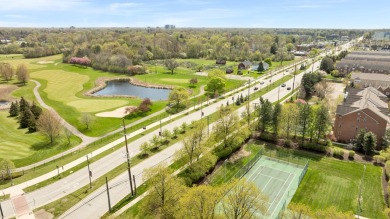 Stunning condo residing on the 13th floor, offering unparalleled on Evergreen Hills Golf Course in Michigan - for sale on GolfHomes.com, golf home, golf lot