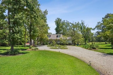 Lovely raised Acadian cottage on an oversized lot fronting the on Covington Country Club in Louisiana - for sale on GolfHomes.com, golf home, golf lot