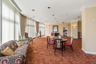 Stunning condo residing on the 13th floor, offering unparalleled on Evergreen Hills Golf Course in Michigan - for sale on GolfHomes.com, golf home, golf lot