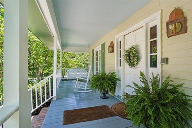 Lovely raised Acadian cottage on an oversized lot fronting the on Covington Country Club in Louisiana - for sale on GolfHomes.com, golf home, golf lot