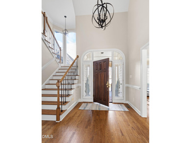 Set within the Stone Brook neighborhood of Governors Club, home on Governors Club in North Carolina - for sale on GolfHomes.com, golf home, golf lot