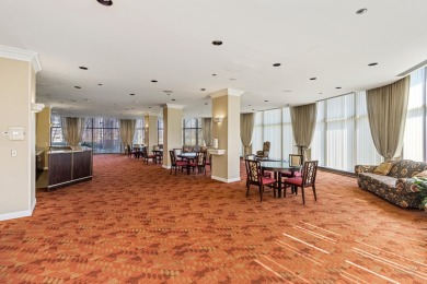 Stunning condo residing on the 13th floor, offering unparalleled on Evergreen Hills Golf Course in Michigan - for sale on GolfHomes.com, golf home, golf lot